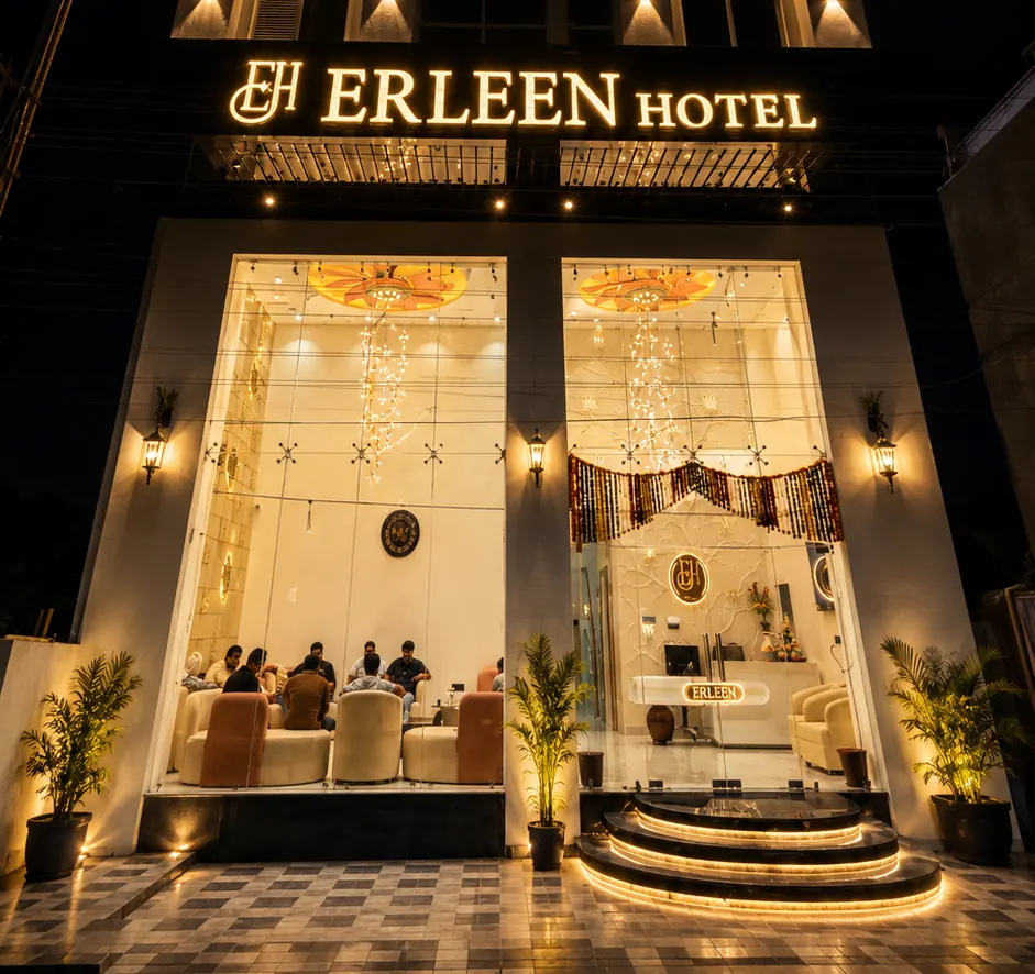 Erleen Hotel & Rooftop Restaurant exterior at night in Indore